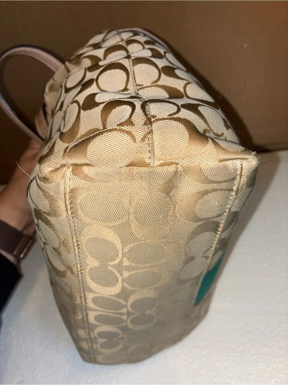 COACH Beige Signature Tote with Teal Center Stripe.